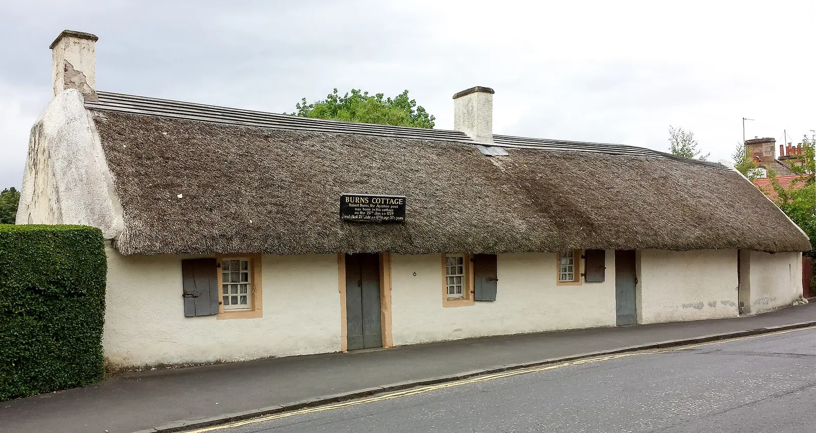 The whitewashed thatched cottage in Alloway where Robert Burns was born