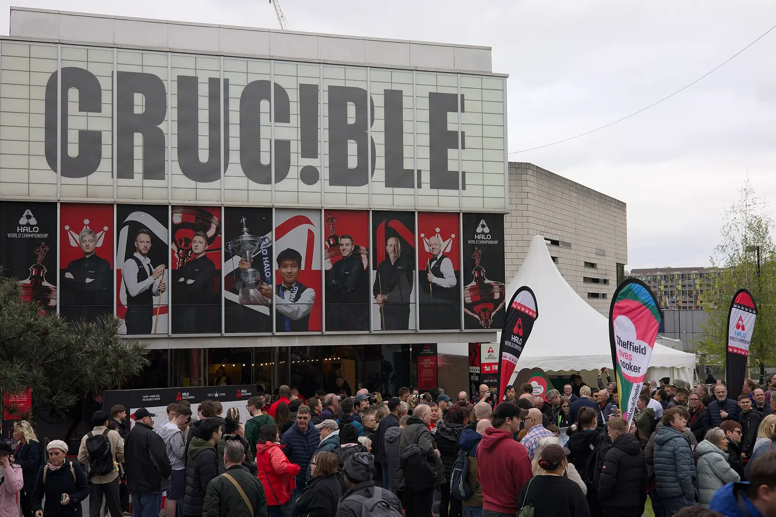 Fans gather outside the Crucible Theatre in Sheffield during the 2026 World Snooker Championship