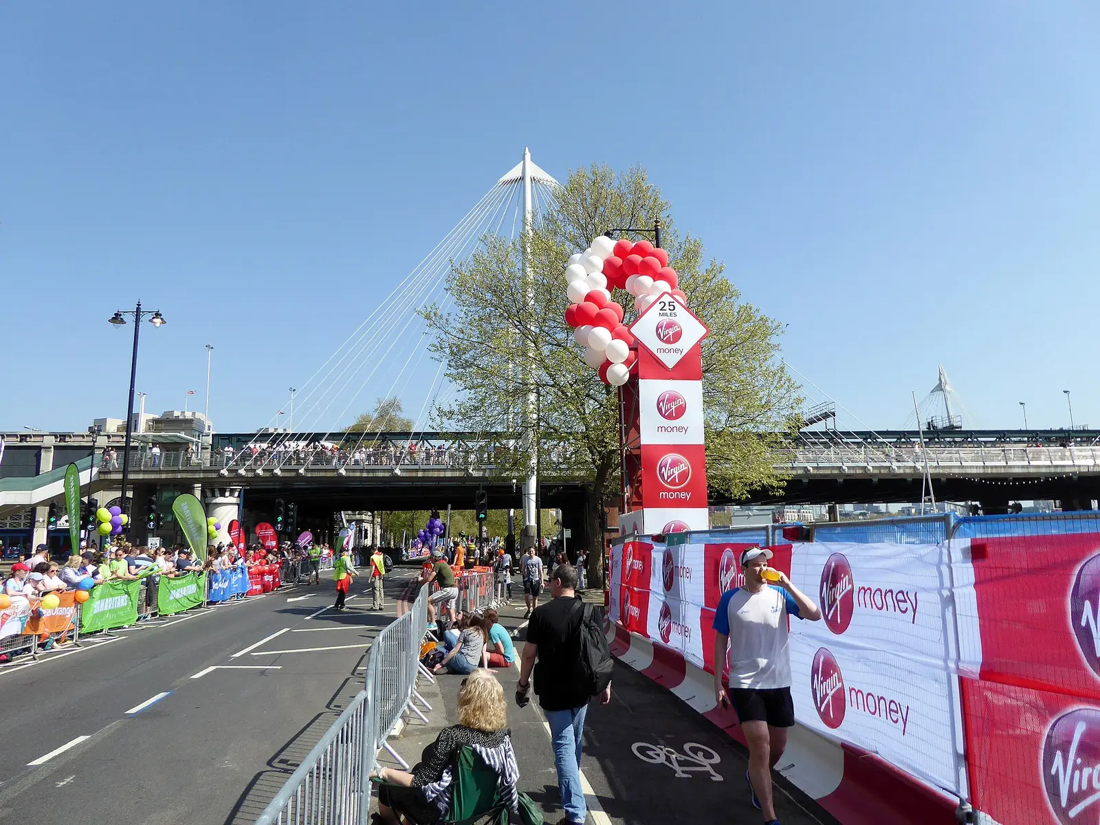 The 25 mile marker and barriers beside the Thames on the London Marathon route